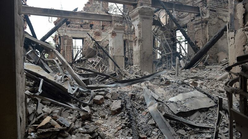 School destroyed as a result of fight not far from the centre of Ukrainian city of Kharkiv. Photograph Sergey BOBOK / AFP