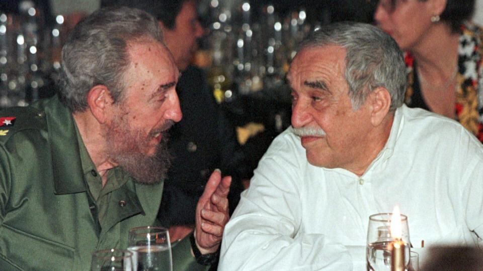 2000: Cuban president Fidel Castro chats with Garcia Marquez over dinner in Havana