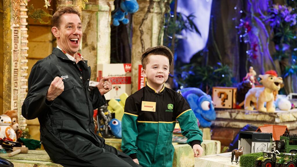 Ryan Tubridy during last year’s Late Late Toy Show with toy tester Darragh Malone from Castlewellan, Co Down. Photograph: Andres Poveda