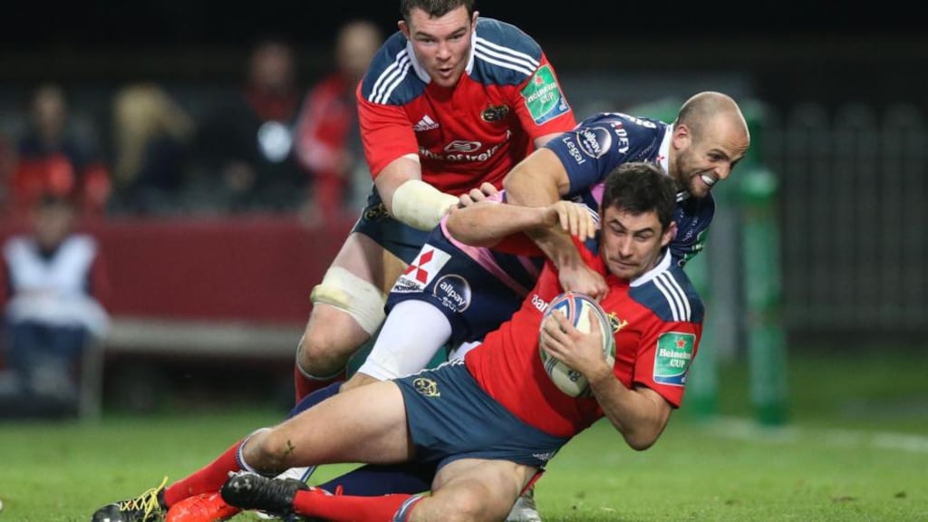 Munster’s Felix Jones is tackled by Gloucester’s Charlie Sharples at the weekend. Photograph: Billy Stickland/Inpho