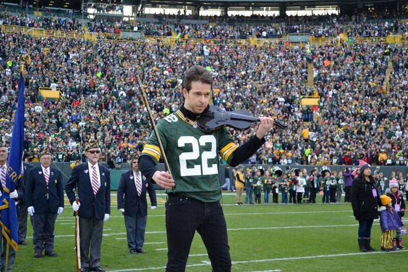 Gregory Harrington playing the US national anthem for the NFL Green Bay Packers at Lambeau Field before a crowd of 77,000 in 2017