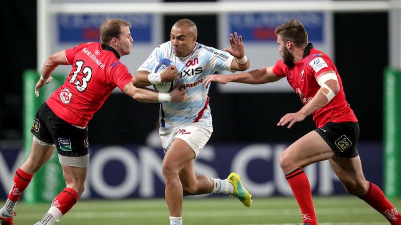 Racing 92’s Simon Zebo tries to break through Will Addison and Stuart McCloskey of Ulster during the Heineken Champions Cup match at Paris La Defense Arena. Photograph: James Crombie/Inpho