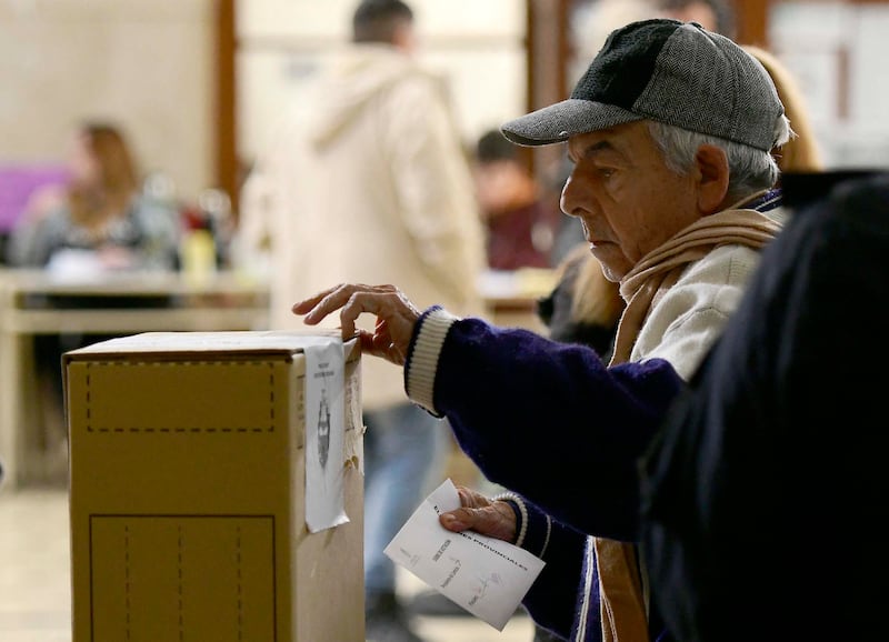 A man casts his vote during the provincial legislative election, in La Plata, Buenos Aires province, Argentina, on Sunday.  Photograph: Stringer/AFP/Getty
