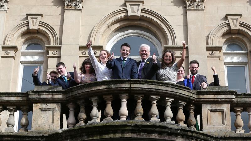 SDLP Leader Colum Eastwood with (next left) Deputy Fearghal McKinney and party colleagues on the balcony of St Columb’s hall before the start of the conference. Photograph by Declan Roughan