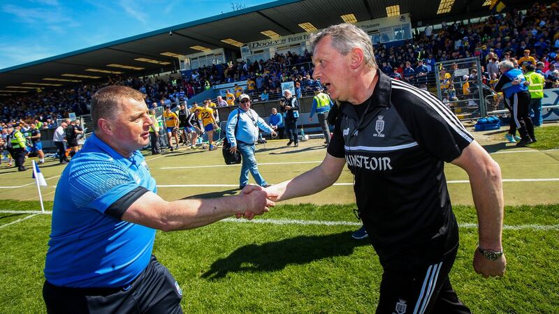 Waterford manager Paraic Fanning with Clare joint manager Donal Moloney after the game. Photograph: Ryan Byrne/Inpho