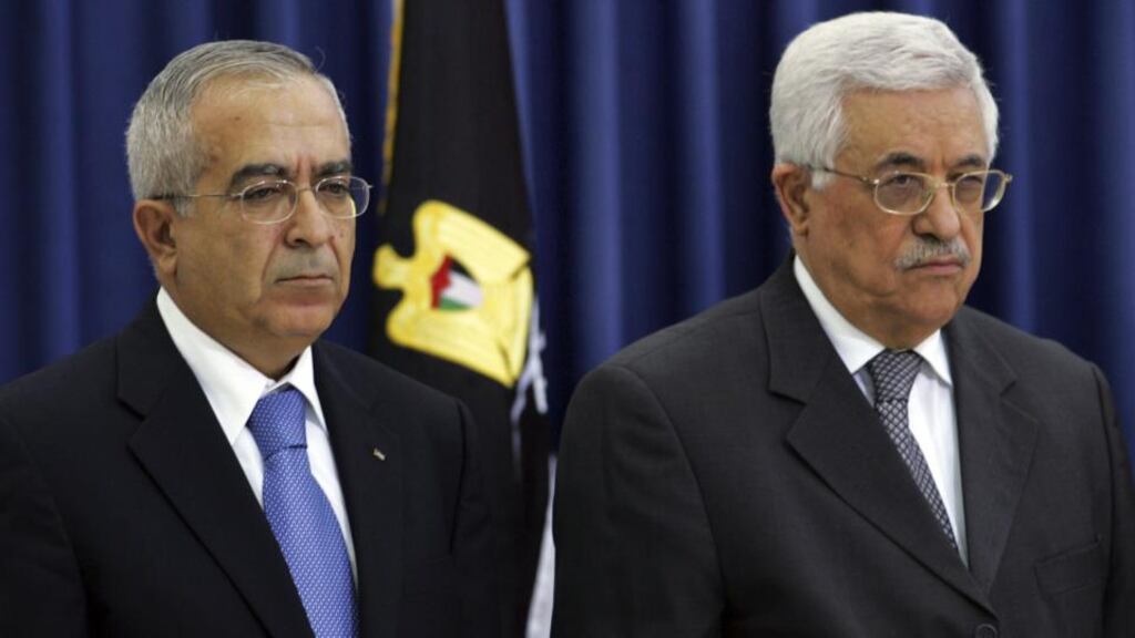 Salam Fayyad (left) with Palestinian president Mahmoud Abbas, who accepted his resignation this month as prime minister of the Palestinian Authority. Photograph: David Silverman/Getty Images
