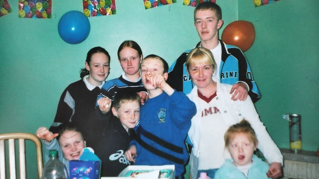 Daniel McAnaspie (top right) with his family during a birthday celebration.