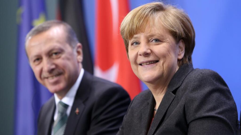 German chancellor Angela Merkel and Turkish Prime Minister Recep Tayyip Erdogan in Berlin. Photograph: Adam Berry/Getty Images