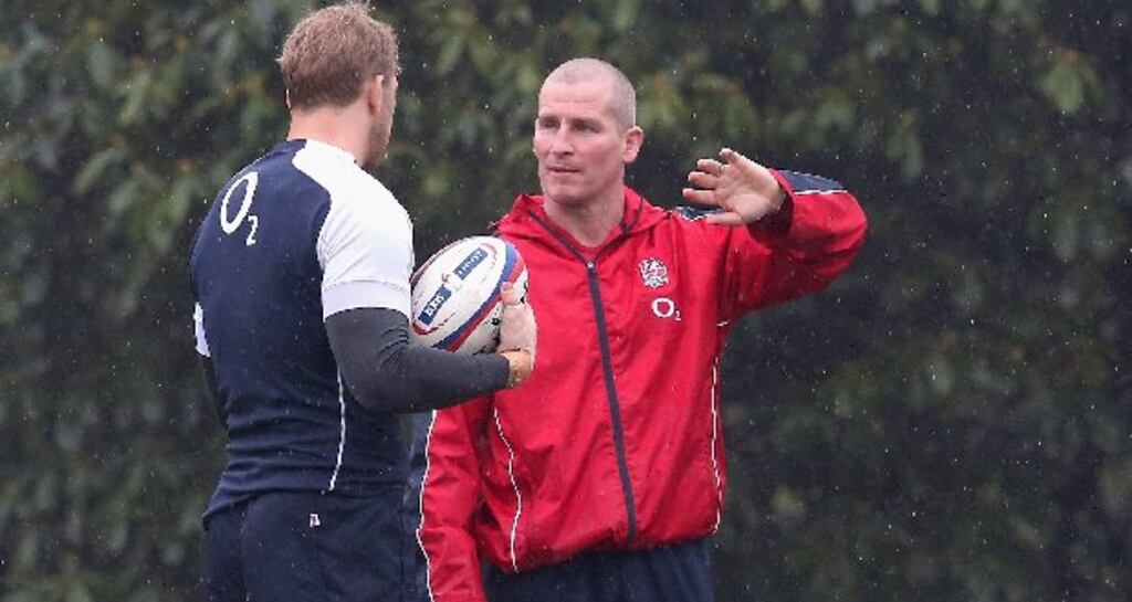 Stuart Lancaster (right) the England head coach talks to his captain Chris Robshaw. Photograph: David Rogers/Getty Images