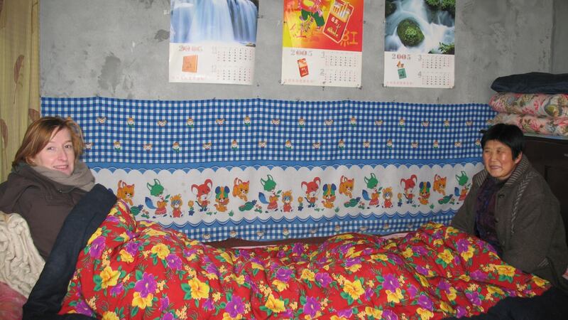 Margaret Ward and friend in a village near Xian in China.