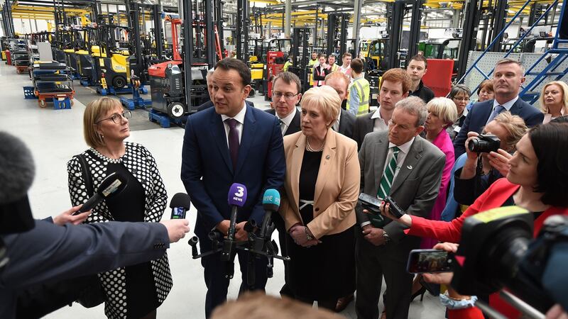 Enterprise Ireland chief executive Julie Sinnamon, Taoiseach Leo Varadkar and Minister for Business, Enterprise and Innovation Heather Humphreys at the opening of the new Combilift headquarters in Monaghan. Photograph: Philip Fitzpatrick/PA Wire