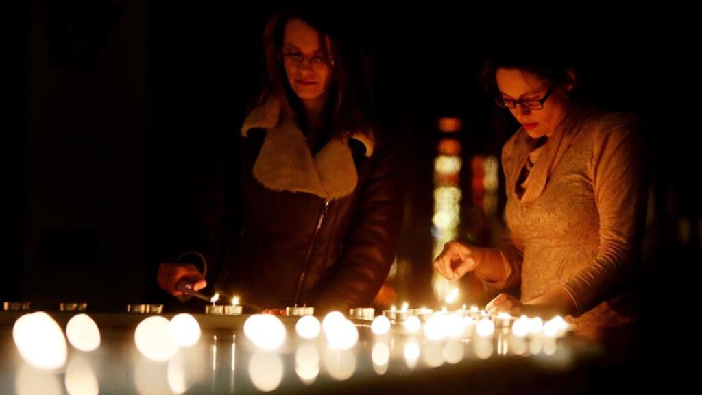 People at a prayer vigil held for Tom O’Gorman, who was found dead at his home in Castleknock, is held at St Teresa’s, Clarendon St, Dublin. Photograph: Brian Lawless/PA Wire