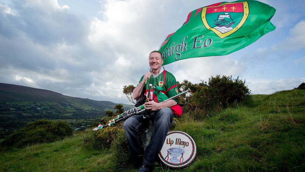 Mayo football Fan and world champion uilleann piper Eamonn Walsh pictured in the Dublin Mountains. Photograph: Tom Honan