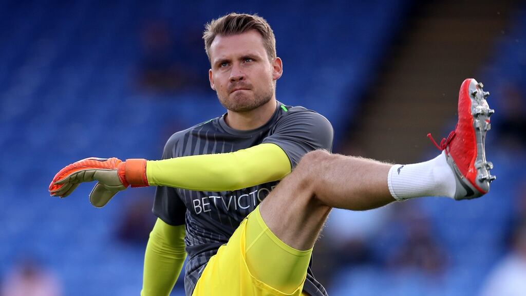 Liverpool goalkeeper Simon Mignolet warms up before the Premier League match against Crystal Palace at Selhurst Park. Photo: Nick Potts/PA Wire
