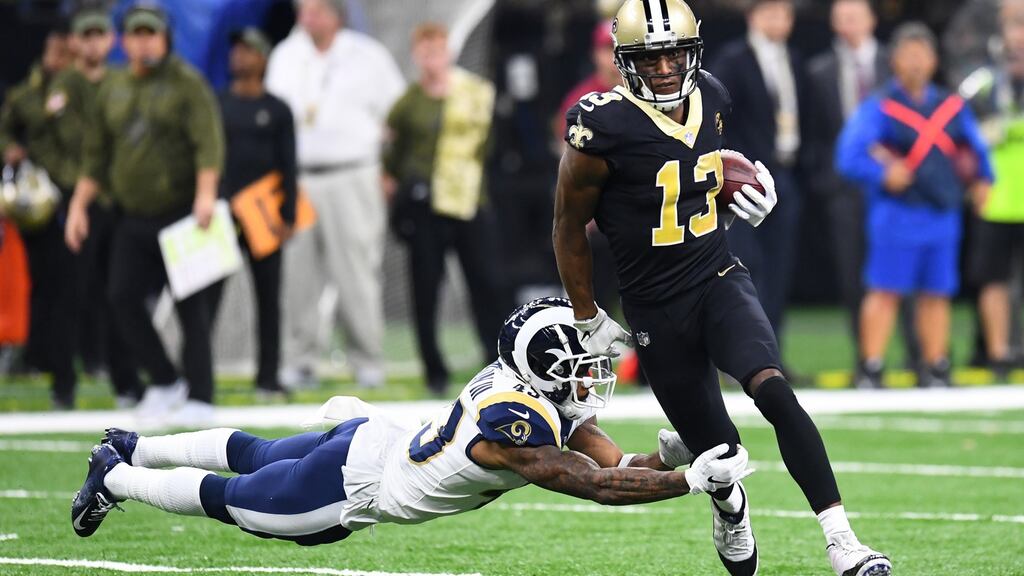 Michael Thomas of the New Orleans Saints breaks a tackle against John Johnson III of the Los Angeles Rams at the Mercedes Benz Superdome in New Orleans, Louisiana. Photo: Scott Cunningham/Getty Images