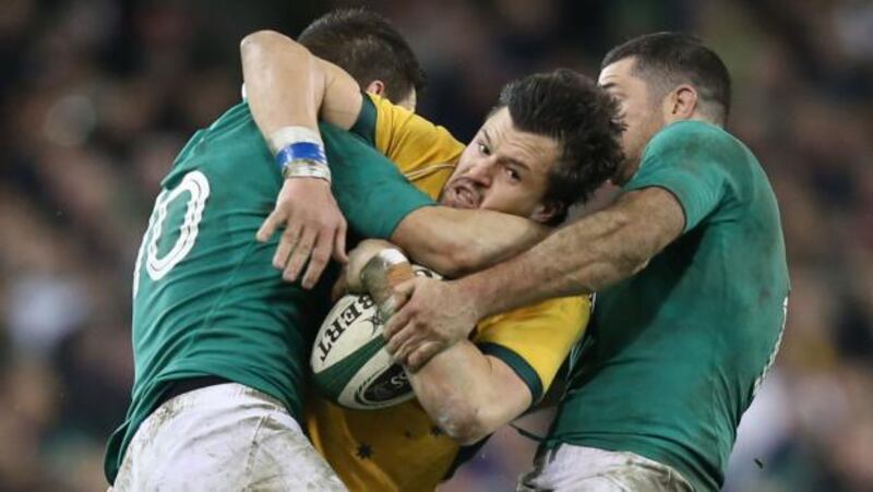 Australia’s Adam Ashley-Cooper is wrapped up by Jonathan Sexton and Rob Kearney of Ireland at the Aviva Stadium in November. Photograph: Colm O’Neill / Inpho