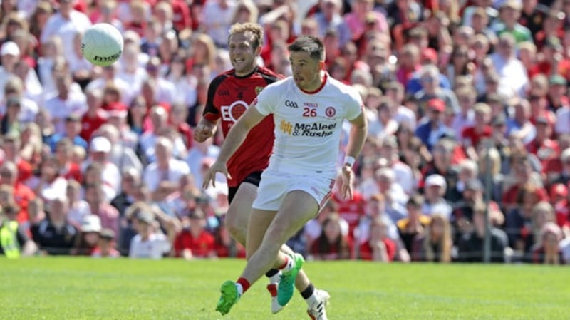 Ronan O’Neill scores his second goal in Tyrone’s Ulster final win over Down. Photograph: Morgan Treacy/Inpho