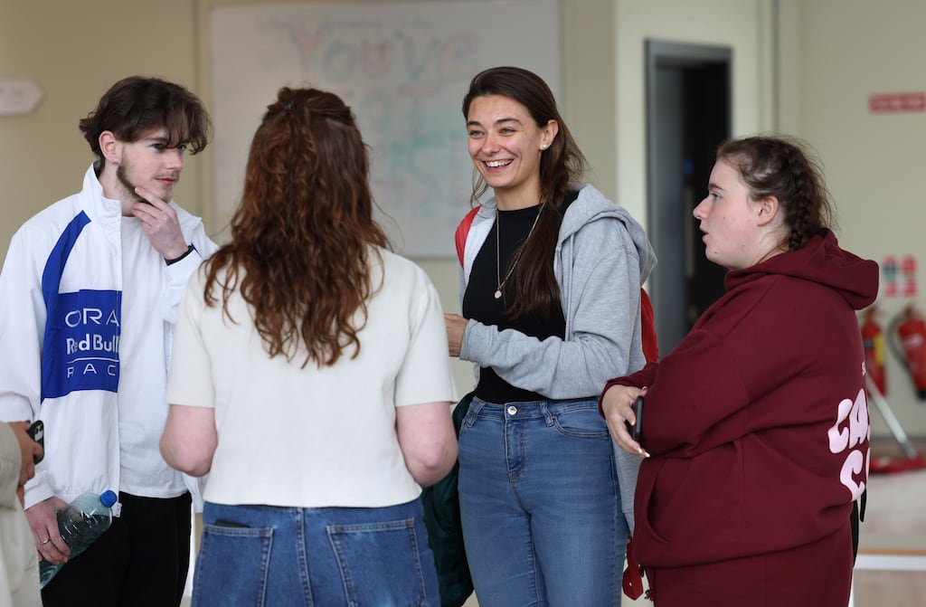 English teacher Sinéad McGowan with Leaving Cert students Páidí Malone, Zuzanna Zoltowska and Sarah Osbourne. Photograph: Dara Mac Dónaill