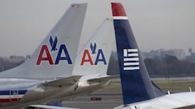 Judge clears way for anticipated merger of AMR and US Airways