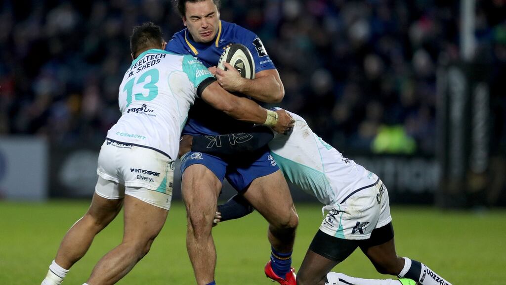 Leinster’s James Lowe is tackled by Bundee Aki and Niyi Adeolokun of Connacht in their Guinness Pro14 clash at the RDS in Dublin on Monday. Photograph: Dan Sheridan/Inpho
