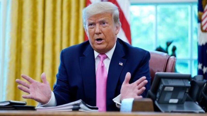 President Donald Trump speaks to the media while meeting with Senate majority leader Mitch McConnell and House minority leader Kevin McCarthy in the Oval Office at the White House on Monday. Photograph: AP