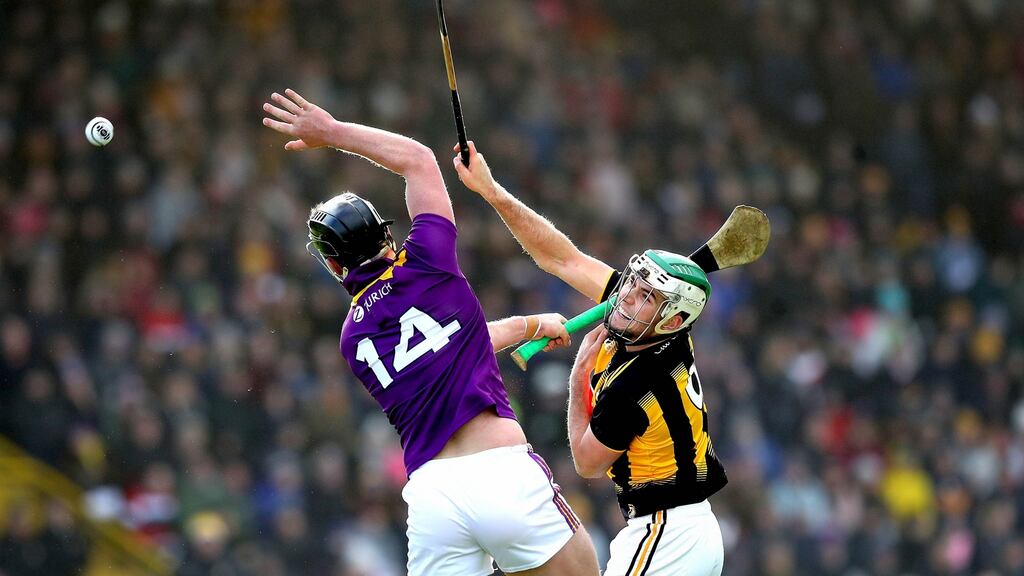 Wexford’s Conor McDonald battles with Kilkenny’s Paddy Deegan during the Allianz Hurling League Division 1B clash at Chadwicks Wexford Park, Wexford. Photograph: Ryan Byrne