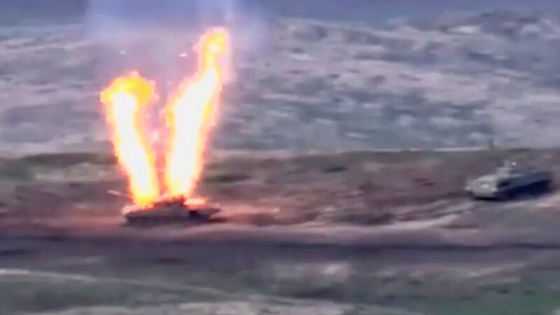An Azeri armoured vehicle ablaze in Nagorno-Karabakh, the disputed region that boders Armenia and Azerbaijan. Photograph: EPA