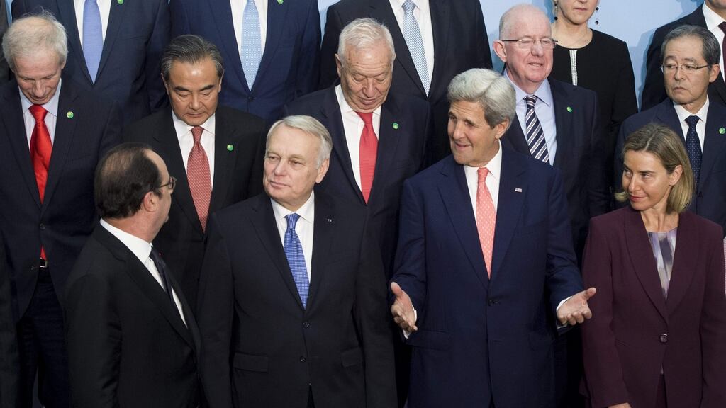 Front, François Hollande, Jean-Marc Ayrault, John Kerry and Federica Mogherini, as well Minister for Foreign Affairs Charlie Flanagan (2nd right, 2nd row), in Paris in a bid to revive the Middle East peace process. Photograph: Saul Loeb AFP/Getty Images