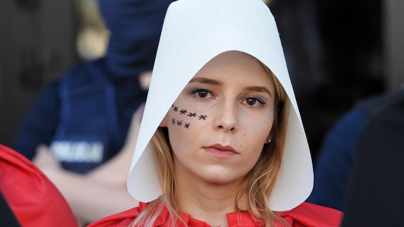 A Protester dressed as a character from The Handmaid’s Tale takes part in a demonstration against government’s plans to terminate the Istambul Convention in Warsaw, Poland. Photograph: EPA