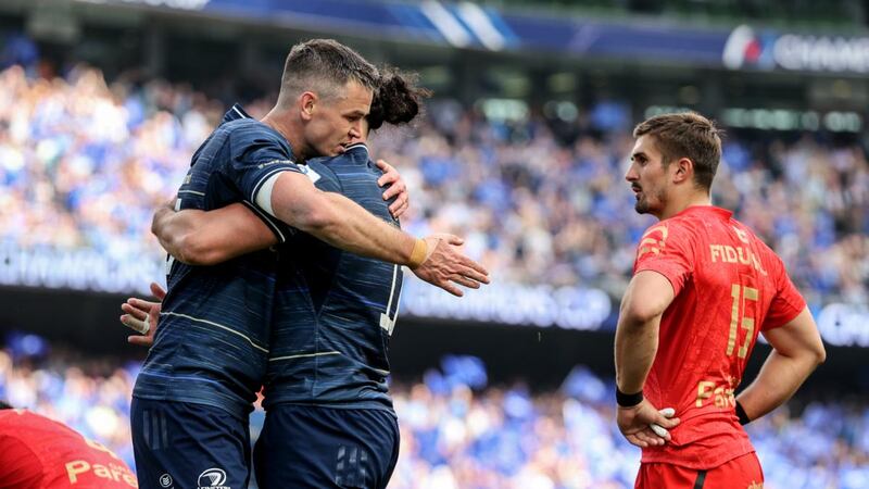 Leinster’s Johnny Sexton celebrates a James Lowe try with his teammate against Toulouse. Photograph: Dan Sheridan/Inpho