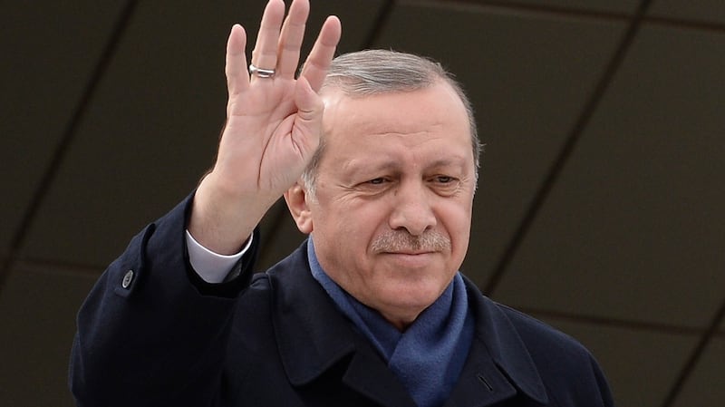 Turkish president Recep Tayyip Erdogan greet supporters at Ankara Esenboga Airport. Photograph: Elif Sogut/Getty Images