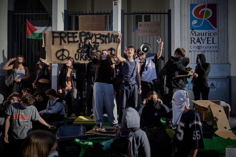 French students block the entrance to Maurice-Ravel School in Paris as part of the nationwide day of protests on Thursday. Photograph: Kiran Ridley/Getty Images