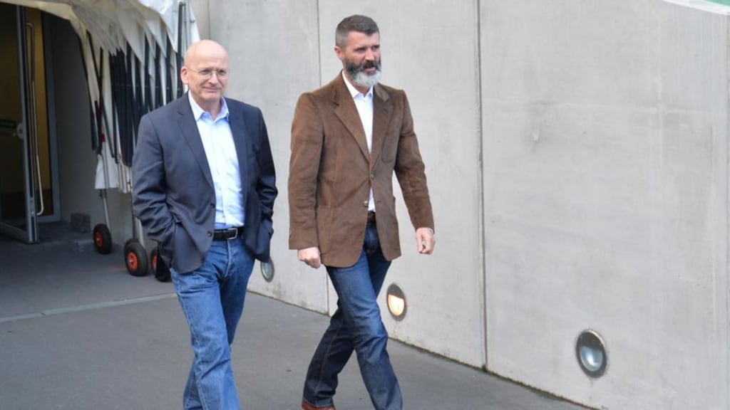 Roddy Doyle and Roy Keane walk onto the Aviva Stadium pitch for the launch of Keane’s biography The Second Half. Photograph: Alan Betson.
