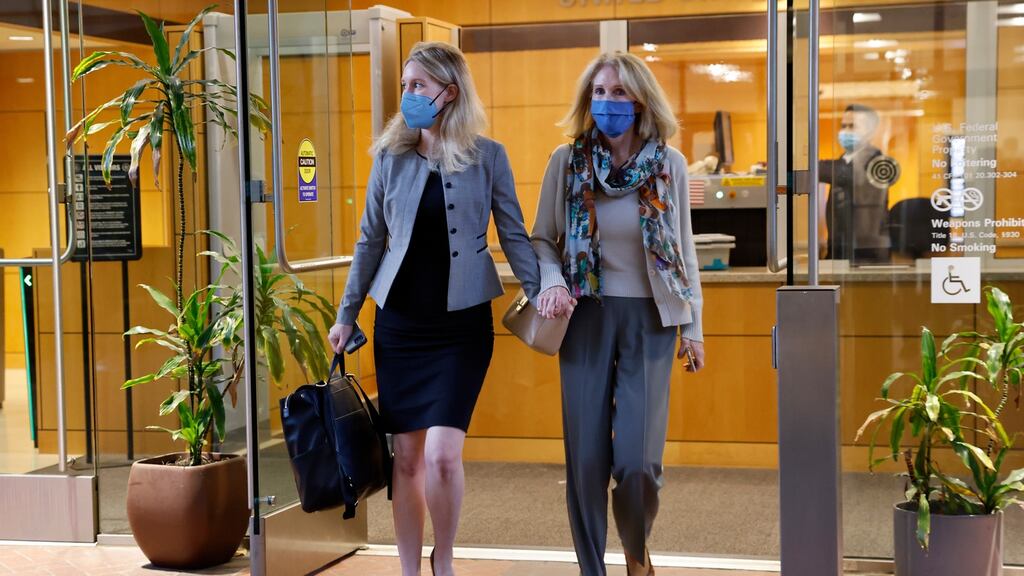 Elizabeth Holmes (L), founder of Theranos, and her mother Noel Holmes leave court in San Jose, California on Tuesday. Photograph: John G Mabanglo/EPA