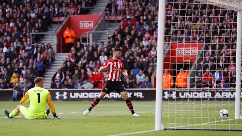 Long misses a great chance after taking it around the goalkeeper. Photo: Peter Nicholls/Reuters