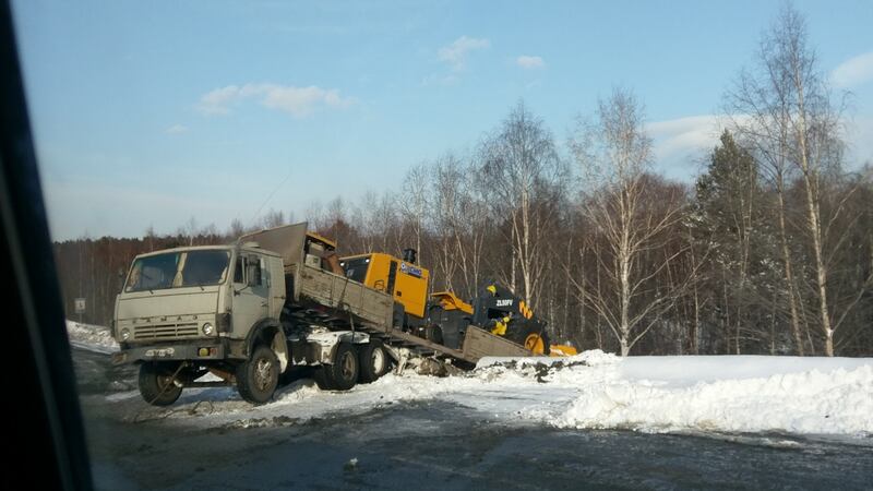 Local roads are littered with cars and trucks that have slid down the side banks