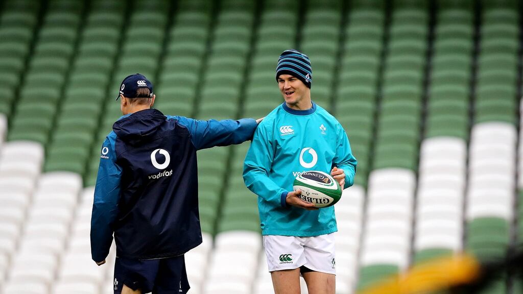 Joe Schmidt with Jonathan Sexton during Ireland’s captain’s run at the Aviva Stadium. Photograph: Ryan Byrne/Inpho