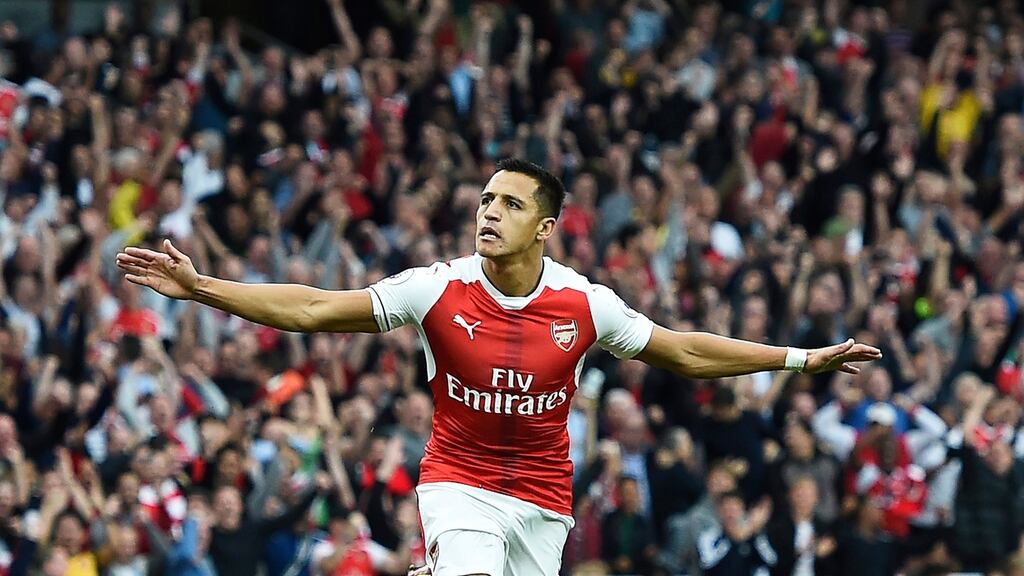 Arsenal’s Alexis Sanchez celebrates scoring at the Emirates. Photograph: PA
