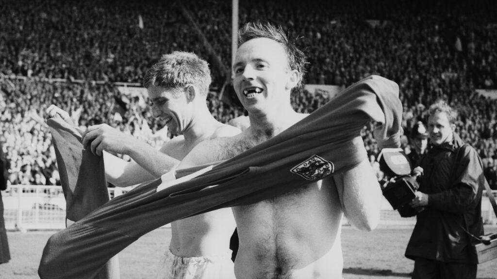 Team-mates Alan Ball, left, and Nobby Stiles celebrate after England’s victory in the 1966 World Cup final at Wembley, 30th July 1966. Photograph: Evening Standard/Hulton Archive/Getty Images