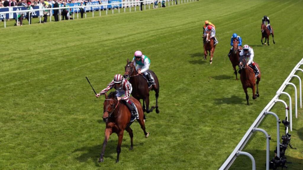 Cirrus Des Aigles ridden by Christophe Soumillon on their way to victory in the Investec Coronation Cup during Investec Derby Day at Epsom Downs Racecourse. Photograph: David Davies/PA Wire