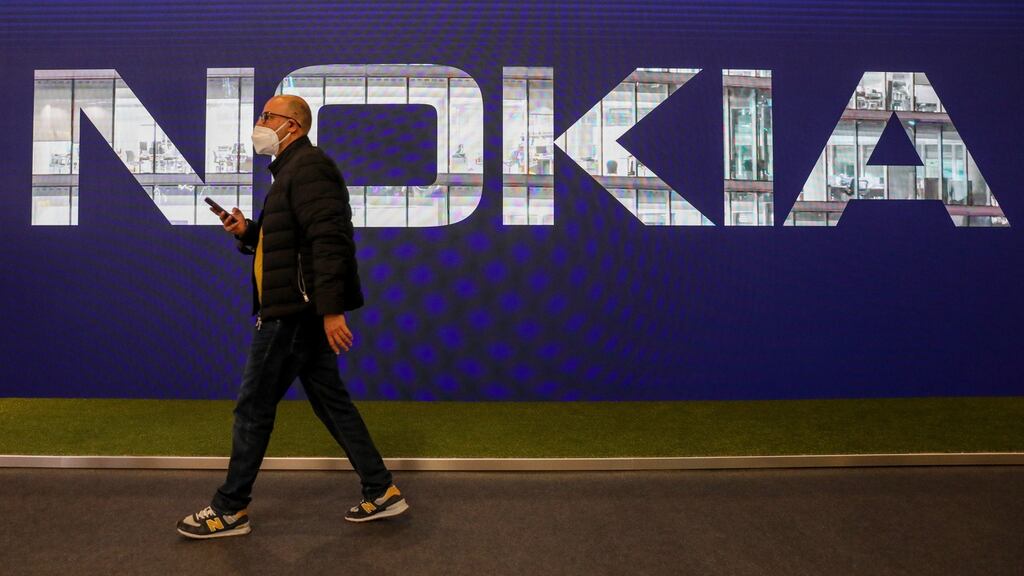 A logo at the Nokia Oyj stand on the opening day of the MWC Barcelona at the Fira de Barcelona venue in Barcelona, Spain. Photograph: Angel Garcia/Bloomberg
