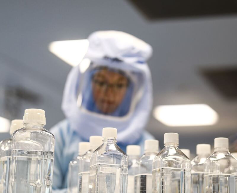 In production: a scientist at BioNTech tests the procedures for manufacturing its mRNA Covid-19 vaccine in March this year. Photograph: Abdulhamid Hosbas/Anadolu via Getty