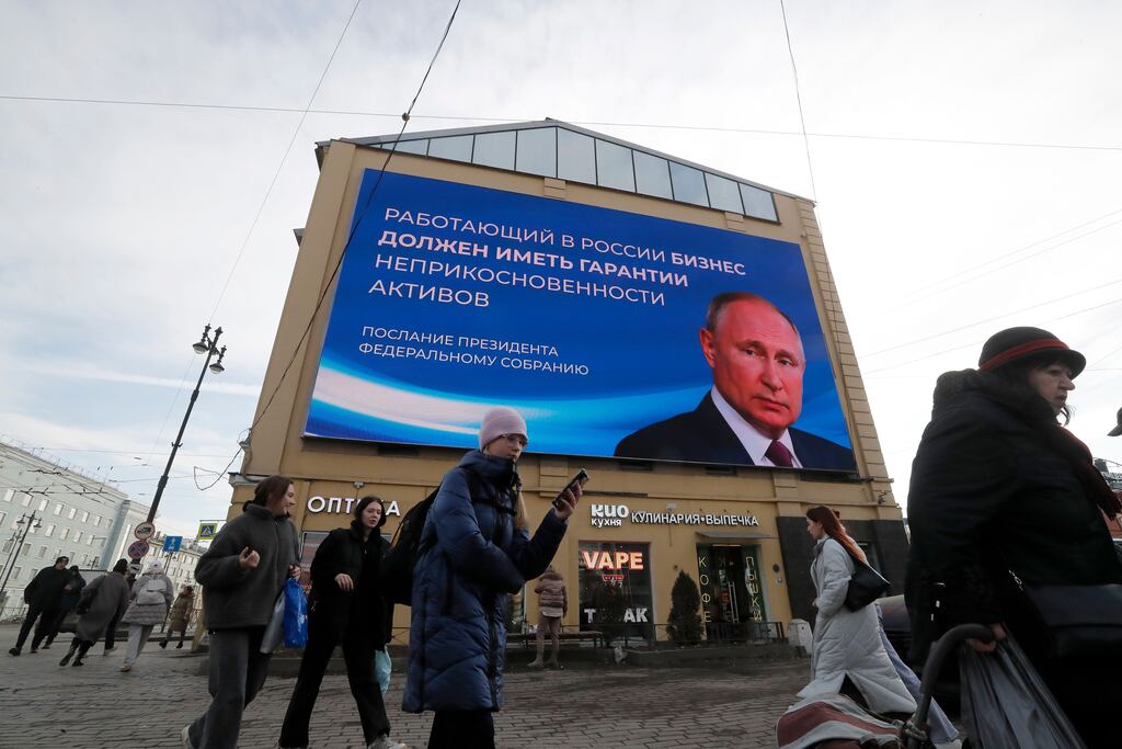 A digital billboard shows Russian president, and presidential candidate, Vladimir Putin in St Petersburg ahead of this weekend's election. Photograph: Anatoly Maltsev/EPA