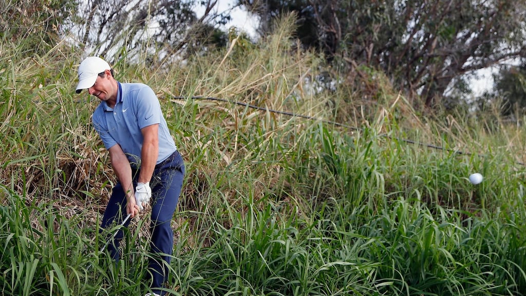 Rory McIlroy of Northern Ireland plays a shot on the 14th hole during the final round of the Sentry Tournament of Champions at the Plantation Course at Kapalua Golf Club in Lahaina, Hawaii. Photo: Kevin C. Cox/Getty Images