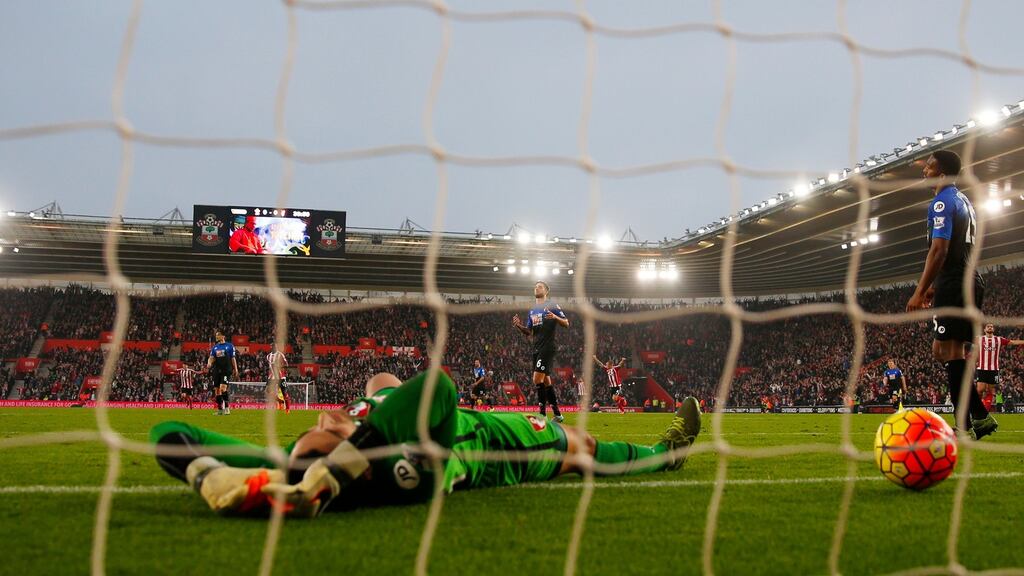 Bournemouth’s Adam Federici looks dejected after Southampton’s Steven Davis scores their first goal. Photograph: Eddie Keogh/Reuters