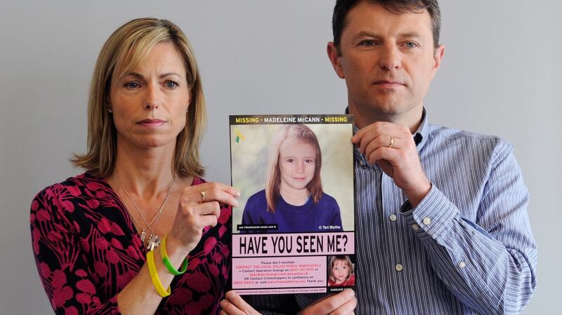 A 2012 photograph shows Kate and Gerry McCann holding an age-progressed police image of their daughter Madeleine during a news conference to mark the 5th anniversary of their daughter Madeleine’s disappearance, in London. File photograph: Facundo Arrizabalaga/EPA