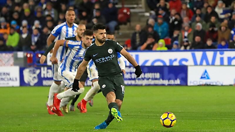 Manchester City’s Sergio Aguero equalises from the penalty spot. Photograph: Danny Lawson/PA