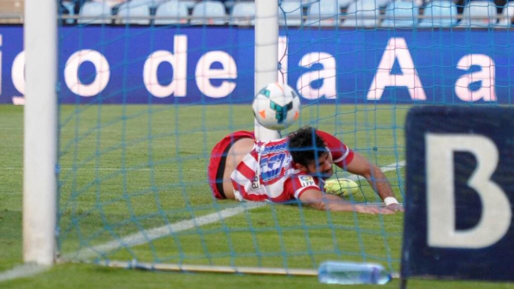 Diego Costa of Atletico Madrid bangs his knee off the goalposts while scoring Atletico’s second goal during against Getafe. Photograph: Denis Doyle/Getty Images