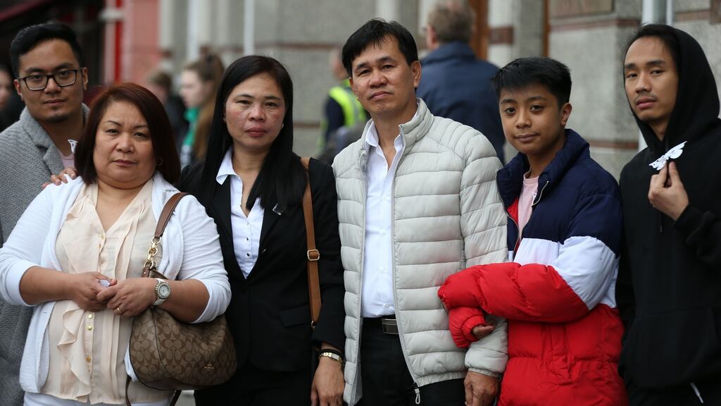 Tess and Danny Valdez, the parents of murdered Jastine Valdez pictured with family at the one year anniversary at Blessed Sacrement Chapel Bachelors Walk Dublin on Sunday. Photograph: Collins Photos