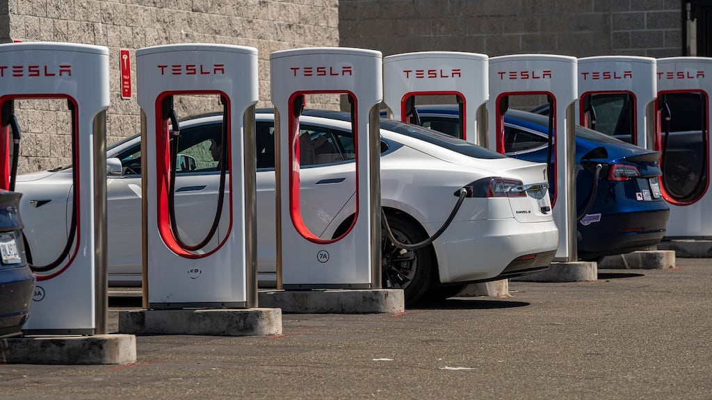 Tesla vehicles at charging stations outside a store in Rocklin, California. Photograph: David Paul Morris/Bloomberg